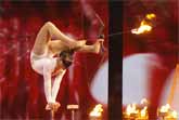 14-year-old Hand Balancer And Contortionist Shoots Flaming Bow and Arrow Blindfolded