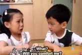 Adorable Boy Comforts Girl On First Day Of School In Taiwan