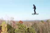 Guy Flies Homemade Hoverboard While Drone Follows Him