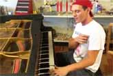 Jacob Tolliver Pounds The Piano In An Ohio Hardware Store