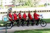 Marching Band On Tandem Bicycle