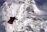 Stunning Wingsuit Flight Through A Winter Wonderland