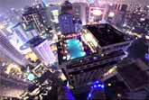 Urban BASE Jumper Crashes A Rooftop Pool Party