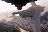Wingsuit Flight Under Arm of Christ Statue in Rio de Janeiro